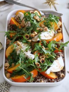 Salade de quinoa, kaki, burrata et noisettes